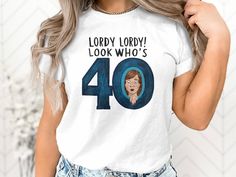 a woman wearing a t - shirt with the number forty and an image of her face