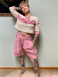 "Vintage 80's cotton crochet shorts, belt, and boxy crop top set by \"Dòna- Firenze Italy\". 100% cotton, made in Italy. This is a really cool set with lots of great details. Very well-made, even the antiqued hardware is stamped. Boxy crop top with half sleeves and henley neckline with snaps. High-waisted shorts with deep pockets and back pockets. Nylon zipper down the front with snap at waistband. Belt is made of crochet. Really nice cotton. Measurements: Marked a size 40, about a US size M and shown modeled on a 5'5\" 36/27/37 person Top: 44\" chest 13\" sleeve 16.5\" length Shorts: 27-29\" waist 13\" rise 9.5\" inseam 22\" length Condition is very good. The top was washed and dried and seems a little wonky, I'm not sure if some of it shrank? but it still looks really cool. Shorts and be Vintage Pink Cotton Shorts, Cool Shorts, Crop Top Shorts, Womens Pajama, Boxy Crop Top, Firenze Italy, Top Shorts Set, Crop Top Set, Cotton Crop Top