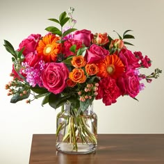 Fiesta Bouquet - DGM Flowers  | Fort Lauderdale Florist Lily Care, Tulips Arrangement, Online Flower Delivery, Flower Delivery Service, Vibrant Flowers, Mini Roses, Gerbera Daisy, Vibrant Flower, All Flowers