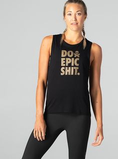 Strut your serious Betty attitude with our Do Epit Shit Tank. Not for the faint of heart! Black with metallic gold ink— BettyStyle is to layer it under a moto jacket with your favorite denim or leather leggings + boots 50% poly, 37.5% combed and ring-spun cotton, 12.5% rayon Relaxed, drapey fit for layering Low cut armhole Curved bottom hem Need a size consultation? Email customer service at brandbettyinc@gmail.com or click the support tab and send us your height, weight, bra + denim size so we Trendy Graphic Print Activewear, Fall Workout Activewear With Graphic Print, Leather Leggings Boots, Leggings Boots, Casual Tanks, Gold Ink, Leather Leggings, Moto Jacket, Metallic Gold