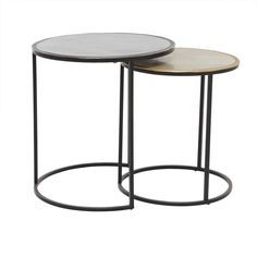 two round tables with metal bases, one on each side and the other on top