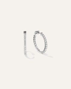 These eternity hoops, made from 14K gold, are built to endure a lifetime. Carefully chosen lab-grown round diamonds adorn both the inner and outer edges of the hoops, enhancing their brilliance and sparkle. Featuring a secure push-back closure, you can wear these stunning earrings with confidence every day.  | Quince | Women's 14K Gold Lab Grown Diamond Inside Outside Hoop Earrings in White Gold Timeless Hoop Earrings With Prong Setting, Minimalist Diamond Hoop Earrings With Brilliant Cut, Minimalist Brilliant Cut Diamond Hoop Earrings, White Gold Diamond Hoop Earrings For Everyday Luxury, Luxury Round Hoop Earrings With Brilliant Cut, Timeless Diamond Hoop Earrings With Accents, Luxury Brilliant Cut Hoop Earrings, Modern Round Hoop Earrings With Single Cut Diamonds, Timeless White Gold Hoop Earrings With Single Cut Diamonds