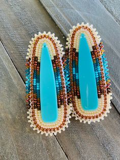 Made with size 11 beads, rhinestone banding & on fingernail posts. **these are more of a turquoise color, for some reason my camera & the lighting make them look blue** Turquoise Beaded Earrings, Powwow Earrings, Cindy Lu, Cab Earrings, Bead Hat, Powwow Outfits, Round Earring, Beaded Hat, Beaded Earrings Tutorials