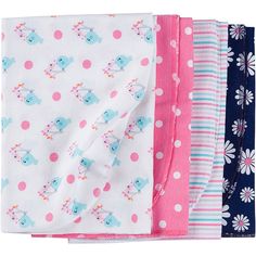 four baby blankets with different patterns and designs on them, all in pink, blue, and white