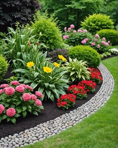 a garden filled with lots of different types of flowers