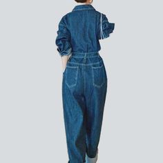 Be transported back to the Pre-millennium with our 2023 Spring-Summer Collection medium wash baggy denim overall! A timeless classic with modern day flair. this one-of-a-kind piece will have you feeling nostalgic and looking fashionably hip. Crafted from luxe denim and featuring a bold buttoned closure. this overall exudes retro chic sophistication.Distinctive Features: 90s Style: Relive the 90s in style with this classic denim overall. Medium Wash: A timeless wash that adds a touch of effortles Washed Blue Denim Jumpsuit With Pockets, Blue Denim Jumpsuit With Pockets, High Rise Denim Blue Utility Jumpsuit, Blue Washed Denim Jumpsuit In Utility Style, Washed Blue Denim Jumpsuits And Rompers With Pockets, Blue Washed Denim Utility Jumpsuit, Utility Style Washed Blue Denim Jumpsuit, Baggy Blue Straight Leg Overalls, High Waist Washed Blue Denim Jumpsuit