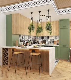 a kitchen with two bar stools next to an island in the middle of it