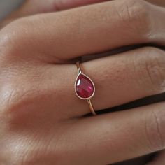 Ruby Pear Stone Ring*14K Gold Birthstone Ring For Girl Birthday Jewelry*For Women Birthday Ring Everyday jewelry # Features * Gram:1.80 gr(approximate weight) * Size: 15 mm * Production Method:CASTİNG +Hand Made Polish  *Gemstones:Cubic Zircon  *Shape:Pear,Cushion * 14 K (0,585) in gold *Special Gift Box  *Like all precious jewels,it comes in its own gift box. *Can include a little gift note  *The Gold Body Of The Ring İs Polished By Hand. *Available in White gold or Rose Gold choosing Enter the Pear Stone Ring, Classic Gemstone Rings For Birthday, Pear-shaped Ring As Gift, 14k Gold Pear-shaped Birthstone Ring For Gift, Teardrop Yellow Gold Ruby Ring Gift, Yellow Gold Ruby Ring As Gift, Yellow Gold Pear-shaped Ruby Ring As A Gift, Yellow Gold Pear-shaped Ruby Ring For Gift, Pear-shaped Yellow Gold Ruby Ring Gift