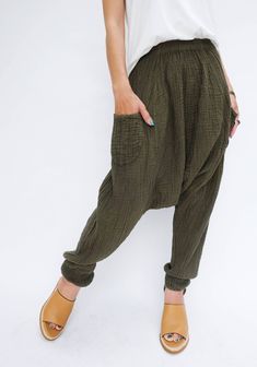 "🚚..ALL ORDERS ARE SHIPPED VIA DHL EXPRESS MAIL Super comfy and cozy harem style pants with a slight stretch. The elastic waist and dropped crotch give your palate room to indulge. They're cropped to stop mid-calf, and elastic at the hems keep the legs in place on those odd instances you find yourself upside-down. * Pullover style * Elastic waistband * Two front pockets * Tapered leg, elastic hem * Unlined Measurements approximately: Waist: 24\" (61 cm) stretching to 54\" (137 cm) Hip: 56\" (14 Pants Boho, Trousers Casual, Womens Pants, Style Pants, Cotton Pants, Upside Down, Dhl Express, Mid Calf, Pullover Styling