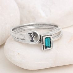 "Made of hammered sterling silver and a Swarovski crystal birthstone, this will be a meaningful statement of those you love ~ always around your finger! This listing is for a set of two rings. One stackable birthstone ring and one stackable Initial/symbol ring. Need more in your stack? Create your own combo here: https://www.etsy.com/listing/230740149 Also available in Gold: https://www.etsy.com/listing/250020772 ♥♥ HOW TO ORDER ♥♥ 1. CHOOSE YOUR SIZE & COMBINATION IN THE DROP DOWNS. 2. IN T Sterling Silver Stackable Rings, May Birthstone Gift, Sterling Silver Stackable Rings For Anniversary, May Birthstone, Sterling Silver Stackable Rings For Anniversary - May Birthstone, Silver Stackable Rings For May Birthstone, Sterling Silver Birthstone Ring For May, Silver Stackable Promise Rings With May Birthstone, Adjustable Silver Birthstone Ring For May, Adjustable Sterling Silver Stackable Rings For May Birthstone, Adjustable Sterling Silver Stackable Rings, May Birthstone