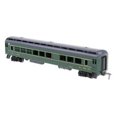 a green and black train car on a white background