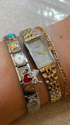 mixing metals & permanent bracelets are IN for 2024 Vintage Bracelet Stack, Mix Metal Rings, Bracelet Stack Mixed Metals, Mixed Metal Jewelry Stack, Mixed Metal Jewelry Aesthetic, Mixed Metal Bracelet Stack, Mix Metal Jewelry, Mixed Metals Jewelry Style