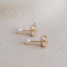 Tiny Elegant Pearl Earrings For Gifts, Dainty Everyday Pearl Earrings In 14k Gold, Dainty 14k Gold-filled Pearl Earrings For Everyday, Dainty 14k Gold Filled Pearl Earrings For Everyday, Minimalist Pearl Earrings As Gift, Minimalist 14k Gold Filled Pearl Earrings For Anniversary, 14k Gold Dainty Pearl Earrings For Anniversary, Dainty Gold Pearl Earrings For Everyday, 14k Rose Gold Pearl Earrings Gift