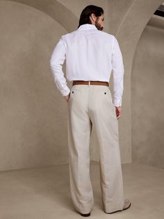 Effortlessly cool and expertly tailored, these relaxed puddle pants are crafted from a lightweight blend of luxurious linen and soft viscose for warm-weather appeal.  RELAXED FIT: Tailored for the at-ease fit of traditional trousers, but with the wid Puddle Pants, Suit Pant, How To Hem Pants, Luxury Linen, Wool Fabric, Natural Linen, Warm Weather, Linen Blend, Fashion News