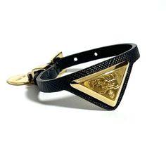 Used Prada Women's Saffiano Triangle Bracelet Leather (Sku: Gzl14k5p) === General === Brand : Prada === Design === Type : Charm Bracelet Gender : Women Material : Metal, Saffiano Triangle Color : Black === Size === Length : 13cm - 15.5cm / 5.11'' - 6.1'' === Included Items === Accessories : None Accessories Notice : Before Purchasing, Please Refer To The Images Of The Accessories Included With The Item. === Condition === Condition : Used (Like New) Ranking : Rank S Used - Mint Condition, Like Ne Elegant Formal Jewelry With Logo Plaque, Designer Formal Jewelry With Logo Plaque, Elegant Black Jewelry With Gold-tone Logo Plaque, Luxury Leather Bracelet With Gold-tone Hardware, Luxury Black Jewelry With Gold-tone Logo Plaque, Luxury Leather Bracelet With Gold-tone Hardware For Formal Events, Luxury Leather Bracelet With Gold-tone Hardware For Formal Occasions, Elegant Leather Bracelet With Gold-tone Hardware, Elegant Leather Bracelet With Gold-tone Hardware For Formal Occasions