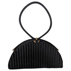 Charming Jean Bernard Figural black suede bag from Paris, 1950's. Black fluted half moon shape with tubular suede loop handle. Faille lining with various compartments. 8.5" x 4.5" x 1.5", Handle 5" loop. 1950's France. Evening Bag With Rolled Round Handles, Elegant Shoulder Bag With Rolled Handles For Evening, Elegant Evening Shoulder Bag With Rolled Handles, Evening Satchel Bag With Rolled Handles, Black Shoulder Bag With Rolled Handles For Evening, Evening Bag With Round Handles, Classic Evening Bag With Round Handle, Suede Bag, Moon Shape