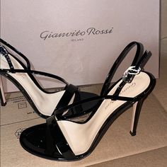 Patent Leather Black Sandal Size 37 . Brand New Never Worn. Comes In Original Box With Dustbag. Black Open Heel Patent Leather Sandals, Gianvito Rossi Plexi, Glamorous Patent Leather Sandals With 4-inch Heel, Gianvito Rossi Sandals, Luxury Black Open Toe T-strap Sandals, Christian Louboutin Pigalle, Strappy Stilettos, Caged Sandals, Michael Kors Crossbody