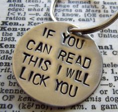 a keychain that says if you can read this i will lick you