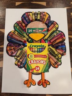 a turkey made out of crayons on top of a piece of paper