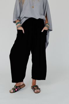 Elevate your boho wardrobe with the Blissful Drifter Pants, so cozy and cool with their trendy wide legs and comfortable fit, you'll feel stylish and confident in any setting! Whether you pair them with your favorite tee or a cozy sweater, these pants are a versatile addition because they feature: Comfortable, breezy, solid linen fabric Loose and slouchy bottoms silhouette High - rise elastic drawstring waistband Statement patch pocket details along the side with pleated details along the bottom Fall Wide Leg Relaxed Fit Harem Pants, Relaxed Fit Wide Leg Harem Pants For Fall, Relaxed Fit Wide Leg Festival Pants, Comfortable Wide Leg Pants, Bohemian Style Baggy Straight Pants, Baggy Bohemian Straight Pants, Festival Wide Leg Relaxed Fit Pants, Relaxed Fit Bohemian Wide Leg Pants For Fall, Bohemian Wide Leg Relaxed Fit Pants For Fall