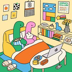 a child's bedroom with toys and books on the bed, including a laptop