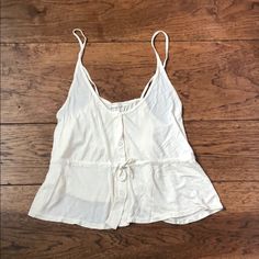 Take 50% Off Your Entire Purchase! Never Worn Super Soft And Cute With Buttons Down Front From Urban Outfitters Summer Beige Tops For Daytime, Beige Tops For Daytime Summer, Beige Tops For Daytime Summer Wear, Beige Sleeveless Top For Daytime, Urban Outfitters Cotton Tops For Vacation, Neutral Cotton Tank Top, Beige Cotton Tank Top For Day Out, Beige Camisole Tops For Beach, Casual Cream Tank Top For Beach