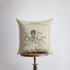 an octopus pillow sitting on top of a table