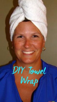 a woman with a towel on her head smiles for the camera while wearing a scrub hat