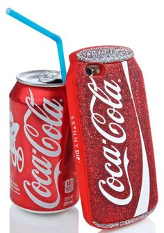 a coca cola can with a straw in it