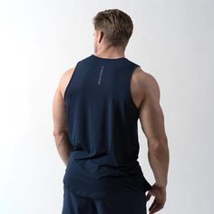 This Men's Performance Tank Top is designed to keep you comfortable without restricting your range of motion. It features moisture-wicking fabric to draw sweat away from the skin and quick-drying material to ensure you always feel dry. Ultra-soft and lightweight, this shirt is perfect for any outdoor or indoor training session. The Model is 5'11", 187lbs, wearing a size Large. Casual Activewear For Light Sports With Technical Fabric, Casual Activewear For Light Sports In Technical Fabric, Navy Moisture-wicking Activewear For Workout, Breathable Recycled Polyester Sports Top, Functional Recycled Polyester Gym Top, Sports Top In Technical Fabric, Navy Go-dry Activewear For Gym, Functional Sports Tops In Technical Fabric, Sports Tops With 4-way Stretch In Recycled Polyester