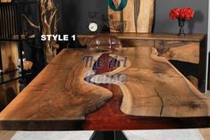 a wooden table with red paint on it