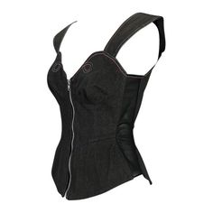 Presenting a stunning denim and mesh Thierry Mugler corset top. From the late 1970s, this top features a zipper at the front, mesh panels at the sides, and bright stitching throughout. Designed and styled in classic Mugler fashion, this piece is cut to create an hourglass figure with structural elements. Approximate measurements: Size - removed Bust: 32” Waist: 24” Shoulder to hem: 22” Mugler Denim, Mugler Corset, Vintage Thierry Mugler, Mugler Fashion, Corset Bustier Top, Native American Print, Pucci Print, Blouses Vintage, Daisy Jones And The Six