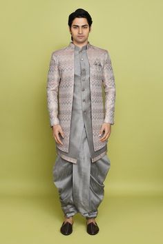 Grey sherwani featuring chevron pattern all over. Paired with a solid sleeveless inner kurta and coordinating dhoti. - Aza Fashions Reception Kurta For Navratri With Traditional Drape, Traditional Drape Nehru Jacket For Diwali Reception, Traditional Naqshi Choli For Eid, Traditional Eid Choli With Naqshi Details, Festive Traditional Naqshi Choli, Navratri Designer Sherwani With Naqshi Detailing, Designer Naqshi Sherwani For Navratri, Navratri Designer Sherwani With Naqshi, Fitted Traditional Wear With Naqshi For Navratri