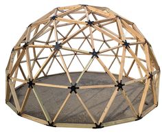 a circular structure made out of wood with black stars on the top and bottom part