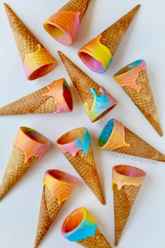 ice cream cones with colorful swirls are on the instagram page for new year's eve