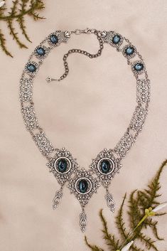 Chateau Necklace - Twilight Blue - Antiqued Silver - Rabbitwood & Reason - photo: La Candella Weddings Ornate Silver Jeweled Necklace, Ornate Silver Jeweled Necklaces, Baroque Historical Design Jewelry For Formal Occasions, Baroque Jewelry With Historical Design For Formal Occasions, Baroque Historical Jewelry For Formal Occasions, Victorian Antique Silver Necklace With Intricate Design, Victorian Jewelry With Oxidized Metal Finish, Victorian Oxidized Metal Jewelry, Ornate Antique Silver Metal Jewelry