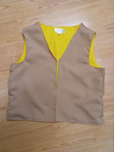 "Vests for kids - any color - for any organization or personal use. Simple and serviceable. Made of a cotton & poly-cotton blend fabric. Vest is lined - can use the same as the outside color or a different color on the inside. (Names can be embroidered on but need to be ordered under a different listing I have titled 'Monogrammed vests\" Please see that listing if you wish to add a name ) Thread for name can be in any color ). 100% wash and dry for easy care and up keep. Patches can be irone Yellow Sleeveless Vest For Work, Girl Scout Vest, Monogram Vest, Patch Vest, Camp Theme, Kids Vest, Cub Scout, Shirt Vest, Cotton Vest