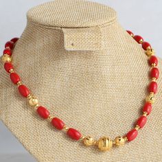 Coral Designs Jewellery, Red Beaded Temple Necklace For Gift, Gold Necklace With Large Red Coral Beads, Traditional Coral Necklace With Colorful Beads, Gold Beads Beaded Necklaces For Festivals, Elegant Red Temple Necklace With Round Beads, Elegant Coral Jewelry With Gold Beads, Red Coral Jewelry With Gold Beads, Gold Necklaces With Colorful Oval Beads