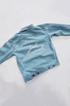 Custom Text Denim Jacket – Spikes and Seams Denim Blue Cotton Jacket With Letter Print, Customizable Blue Denim Jacket, Customizable Denim Jacket For Spring, Spring Customizable Denim Jacket, Custom Embroidered Long Sleeve Denim Jacket, Customizable Long Sleeve Denim Jacket, Customizable Denim Jacket, Customizable Blue Denim Jacket With Long Sleeves, Denim Jacket Wedding