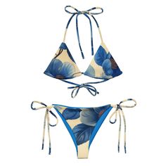 Stay comfortable and stylish all summer with this All-Over Print Recycled String Bikini set. It's made from soft recycled polyester with double-layering and UPF 50+. Style the straps how you like, and get ready to swim!  * Soft and stretchy material with UPF 50+ * Sizes up to 6XL * Bikini top comes with removable padding for comfort * Multiple ways to tie and style the bikini set * Color design options for swimwear lining Disclaimers:  * Due to the 2-layered construction and internal stitching, Blue Printed Swimwear For Vacation, Printed Blue Swimwear For Vacation, Blue Printed Halter Neck Swimwear, Blue Printed Swimwear For Beach Party, Blue Printed Swimwear For Summer, Blue Tropical Printed Swimwear, Blue Printed Tropical Swimwear, Blue Floral Print Swimwear, Blue Floral Print Swimwear For Beach Party