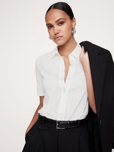 This timelessly tailored button-down top is cut from our silky cotton jersey—a fabric we love for its beautiful drape and dressed-up look.  Semi fitted.  Point collar and  button front.  Straight hem.  Semi fitted.  Elbow-length sleeves.  Above-hip length.  Model: Size S, 5'10" (178cm). Cotton Bottoms, Contemporary Outfits, Women's Sweaters, Create Outfits, Elbow Length Sleeve, Womens Clothing Tops, Women Clothes Sale, Banana Republic, Timeless Fashion