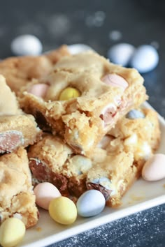 a white plate topped with cookies and candy