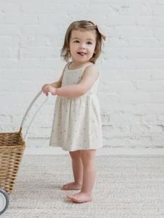 Meet the Soleil Pointelle Bodysuit Dress, your little one's perfect outfit for the sun-soaked days. This dress boasts a charming strap tank design with built-in snap bodysuit for easy changes, while the delicate picot edge detailing along the neckline and armholes adds a touch of sweetness. It's effortless style and comfort makes it a go-to choice for anything from running errands to playing on the beach. Made of 100% Organic Cotton Pointelle Fabric Nickel-free snap crotch Water-based dyes ensur Pointelle Bodysuit, Pointelle Fabric, Playing On The Beach, Pajama Romper, Bodysuit Dress, Tank Design, Burp Cloths, Baby Romper, Sock Shoes