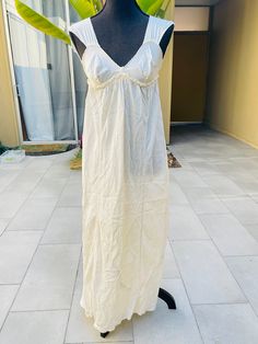 "50s Silk Long Full Slip Dress Vintage Flowing Nightgown Scalloped Edge Appears handmade Ties in back and goes all the way around just below the bust Great condition, one very small stain on the back..nothing major by any means but worth mentioning..I've included close up pictures of the stain Measures (laying flat): 16\" pit to pit and 50\" long See pictures for additional details" Vintage V-neck Sleep Dress, Sleeveless Cotton Nightgown For Wedding Night, Cotton Sleeveless Nightgown For Wedding Night, Empire Waist Dress For Wedding Night In Summer, Cotton Maxi Dress With Empire Waist For Daywear, Vintage Sleeveless Nightgown For Beach, Sleeveless Cotton Vintage Nightgown, Vintage White Nightgown For The Beach, Vintage V-neck Sleepwear