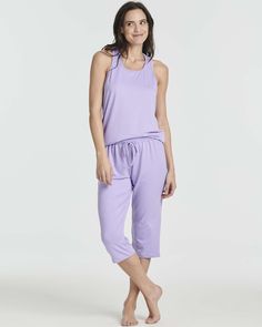 Stay Cool and Cozy: Our Summer Capri Set is perfect for warm nights, featuring a sleeveless tank top and capri pants. Enjoy the lightweight and breathable design, ideal for lounging or a restful night's sleep. Perfect Fit for Every Woman: Available in Plus Size XXL, our Women's Pajama Sets are designed for all body types. The soft, stretchy fabric ensures a comfortable fit, with moisture-wicking properties to keep you dry all night. Versatile Loungewear: Lounge in style with our Pajama Tops and Capri Set, Boys Bottoms, Womens Pyjama Sets, Pajama Set Women, Active Women, Mens Activewear, Sleeveless Tank Top, Pajamas Women, Active Wear For Women