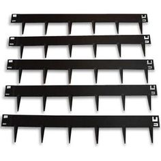 four black metal shelf brackets on a white background