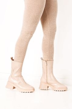 Amp up your outfit of the day with these boots. Featuring a nude block heel material with a cleated heel, we're obsessed. Court Attire, Nude Boots, Corporate Attire, Size 11 Heels, Rain Boot, Your Outfit, Wedge Boot, Over Knee Boot, Rain Boots