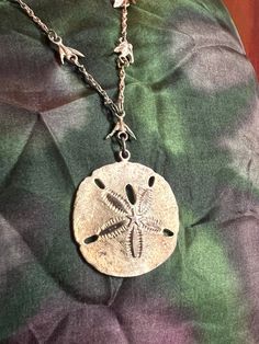 "Charming gold tone sterling silver sand dollar necklace with dove details Chain 19\" Pendant 1 1/8\"" Sand Dollar Necklace, Sand Dollar, Ann Arbor, Pierced Earrings, Arbor, Earings Piercings, Vintage Sterling Silver, Charm Necklace, Etsy Earrings