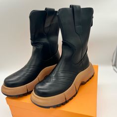 Elevate Your Winter, Summer, Fall, Or Spring Style With These Chic Celbreez Platform Boots For Women. These Boots Feature A Chunky Heel And Round Toe Design That Provides Both Comfort And Style. The Black Color And Sleek Design Make It Perfect For Any Casual Occasion. These Boots Are Available In Various Sizes To Fit Your Needs. Step Out In Style With These Celbreez Platform Boots For Women. Trendy Martin Boots For Outdoor Spring Use, Trendy Martin Boots For Spring Outdoor, Black Platform Martin Boots For Spring, Trendy Black Platform Boots For Outdoor, Trendy Black Martin Boots With Chunky Platform, Black Ankle-high Martin Boots For Spring, Black Platform Boots With Round Toe For Spring, Trendy Black Flat Heel Martin Boots, Black Ankle Martin Boots For Spring