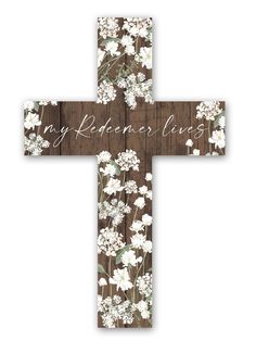 a wooden cross with flowers on it and the words my remembrance is written in white